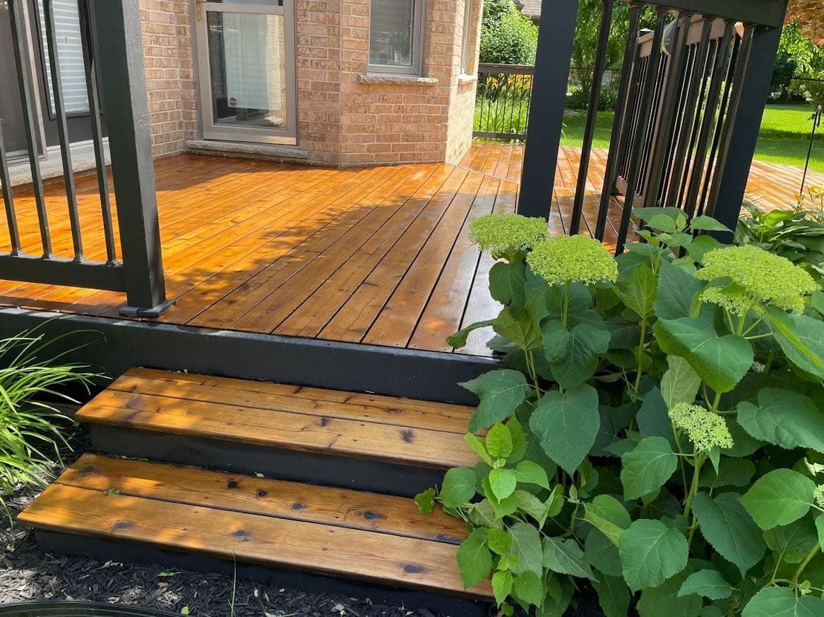 Same deck before staining, greyed boards