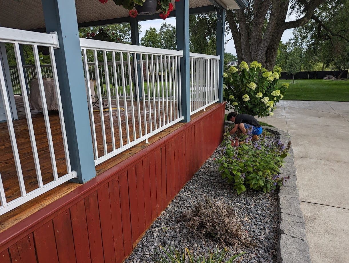 Deck skirting and posts stained a rich red-brown