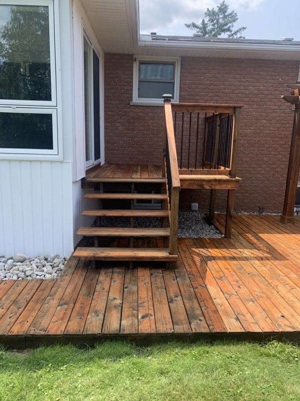 Deck stairs and landing freshly stained with penetrating oil-based stain