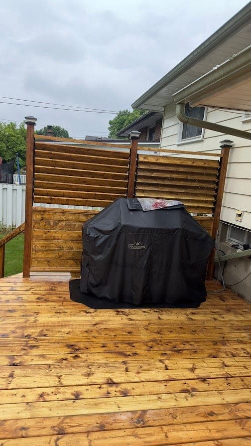 Pressure washing a privacy fence and screen