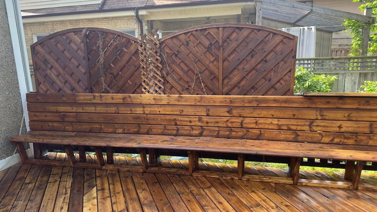 Lattice-top fence freshly stained