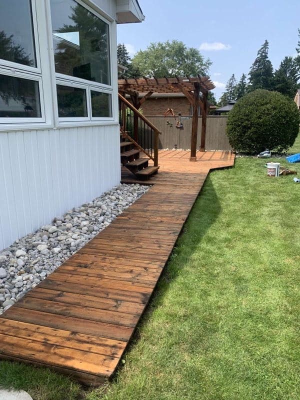 Pressure washed and stained fence in Waterloo